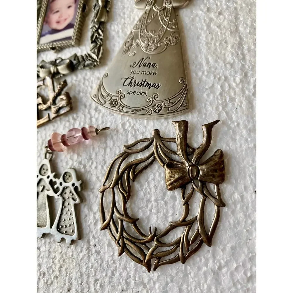 vintage-style metal holiday decorations features silver-toned pewter ornaments